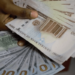 Naira Slides to Record Low, Nears Parallel Market Rate 5 Naira Slides to Record Low, Nears Parallel Market Rate