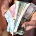 Naira Hits Record Low Against Dollar Amid Market Fluctuations