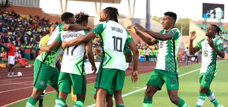 Nigeria's forward Samuel Chukwueze (2L) celebrates with teammates after scoring the opening goal during the Group D Africa Cup of Nations (CAN) 2021 football match between Nigeria and Sudan at Stade Roumde Adjia in Garoua on January 15, 2022. (Photo by Daniel BELOUMOU OLOMO / AFP) (Photo by DANIEL BELOUMOU OLOMO/AFP via Getty Images)