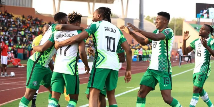 Nigeria's forward Samuel Chukwueze (2L) celebrates with teammates after scoring the opening goal during the Group D Africa Cup of Nations (CAN) 2021 football match between Nigeria and Sudan at Stade Roumde Adjia in Garoua on January 15, 2022. (Photo by Daniel BELOUMOU OLOMO / AFP) (Photo by DANIEL BELOUMOU OLOMO/AFP via Getty Images)