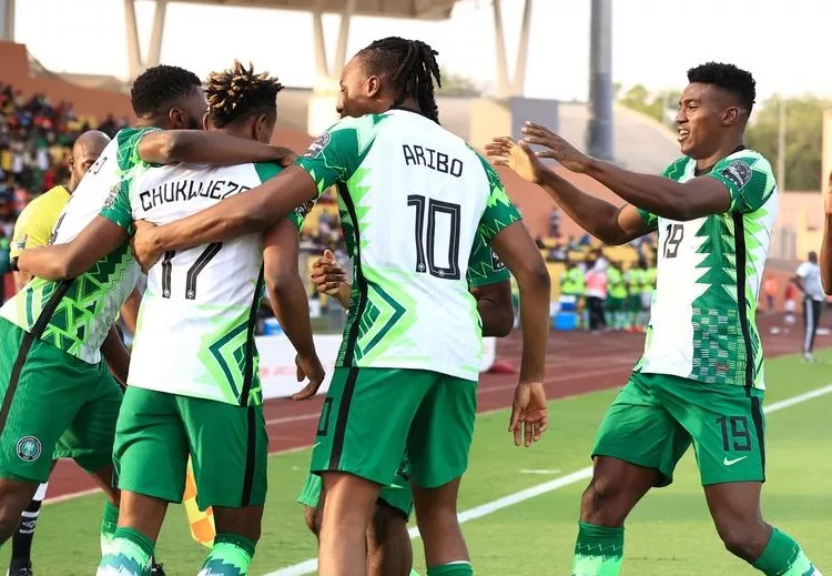 Nigeria's forward Samuel Chukwueze (2L) celebrates with teammates after scoring the opening goal during the Group D Africa Cup of Nations (CAN) 2021 football match between Nigeria and Sudan at Stade Roumde Adjia in Garoua on January 15, 2022. (Photo by Daniel BELOUMOU OLOMO / AFP) (Photo by DANIEL BELOUMOU OLOMO/AFP via Getty Images)