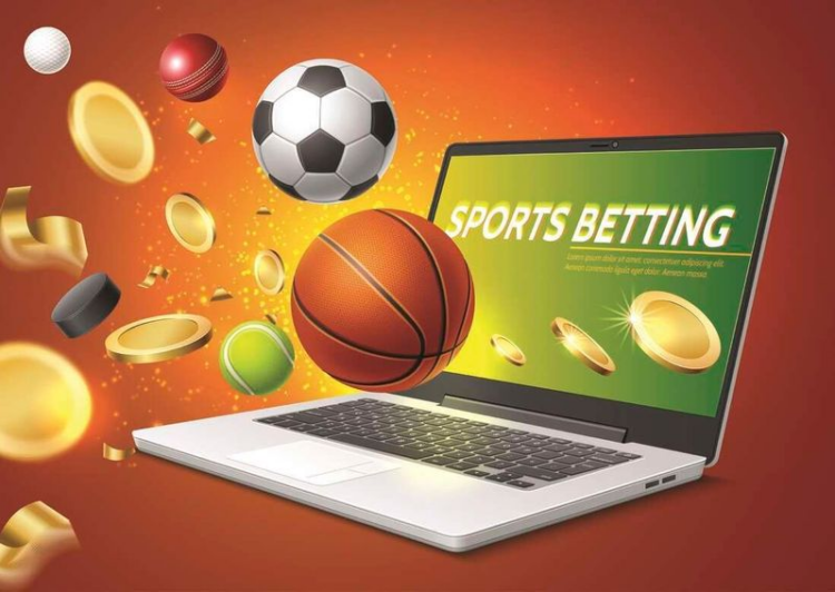 Laptop with words related to sports betting on screen.