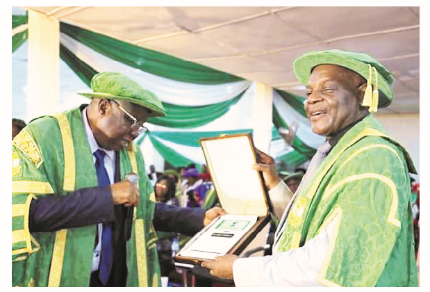 TETFund: Elevating Higher Education With In-school Hostel Constructions 1 The vice-chancellor, University of Nigeria Nsukka, Professor Charles Arinzechukwu Igwe presenting a plaque to the executive secretary of TETFund, Arc. Sonny S. T. Echono as the university 's 51st convocation lecturer recently.