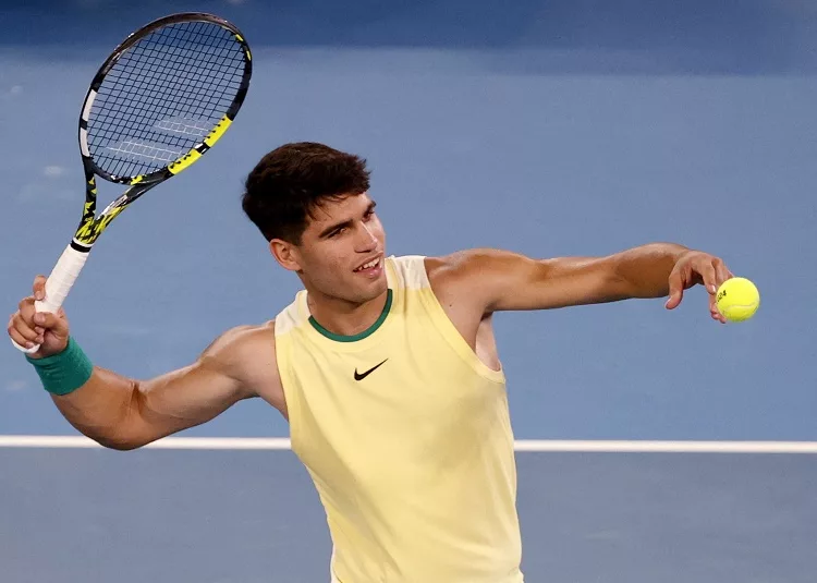 Tennis - Australian Open - Melbourne Park, Melbourne, Australia - January 16, 2024 Spain's Carlos Alcaraz reacts after winning his first round match against France's Richard Gasquet REUTERS/Ciro De Luca