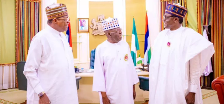 President Bola Ahmed Tinubu (middle); Yobe State Governor Mai Mala Buni (right), and minister of Police Affairs, Ibrahim Gaidam during a meeting at the Presidential Villa