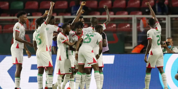 Soccer Football - Africa Cup of Nations - Group A - Cape Verde v Burkina Faso - Stade d'Olembe, Yaounde, Cameroon - January 13, 2022 Burkina Faso's Hassane Bande celebrates scoring their first goal with teammates REUTERS/Mohamed Abd El Ghany