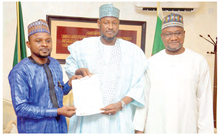 I'm Deeply Honoured By LEADERSHIP Award – Gov Radda 1 Katsina State Governor Dikko Umar Radda (middle) receiving his letter of nomination as LEADERSHIP Governor of the Year 2023 from the group managing director, LEADERSHIP Group Ltd, Muazu Elazeh (left), and director, LEADERSHIP Group, Abraham Nda-Isaiah, in Abuja yesterday