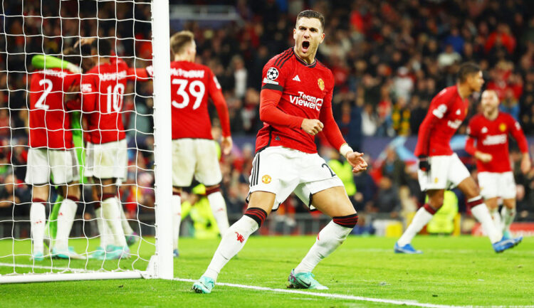 Soccer Football - Champions League - Group A - Manchester United v FC Copenhagen - Old Trafford, Manchester, Britain - October 24, 2023 Manchester United's Diogo Dalot celebrates after Andre Onana saved a penalty missed by FC Copenhagen's Jordan Larsson REUTERS/Molly Darlington