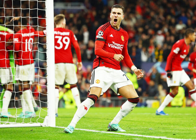 Soccer Football - Champions League - Group A - Manchester United v FC Copenhagen - Old Trafford, Manchester, Britain - October 24, 2023 Manchester United's Diogo Dalot celebrates after Andre Onana saved a penalty missed by FC Copenhagen's Jordan Larsson REUTERS/Molly Darlington