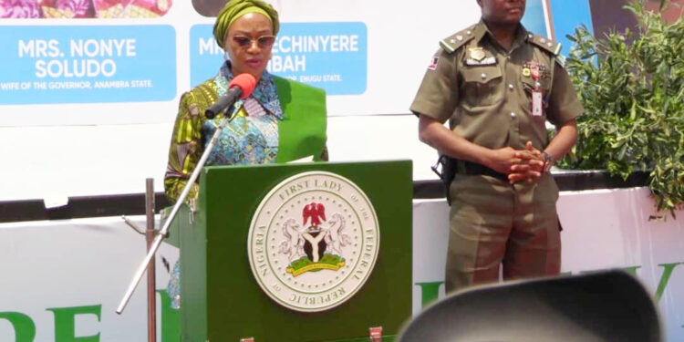 First lady Remi Tinubu on a podium
