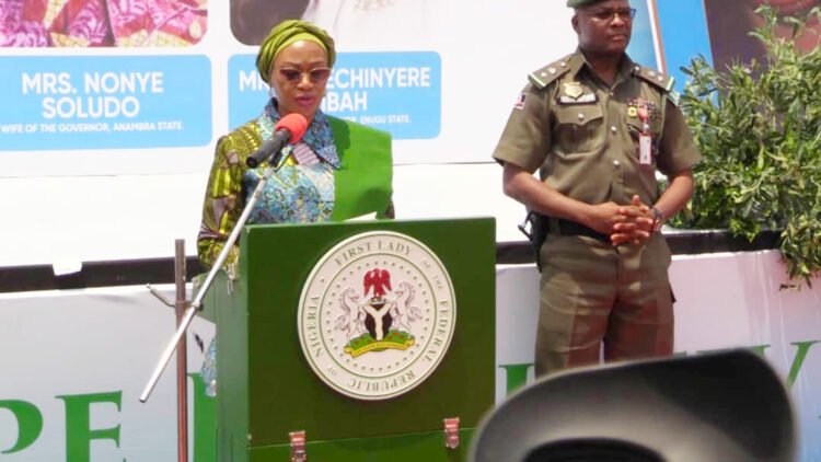 First lady Remi Tinubu on a podium