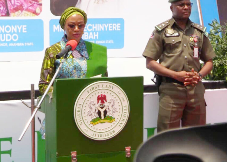 First lady Remi Tinubu on a podium