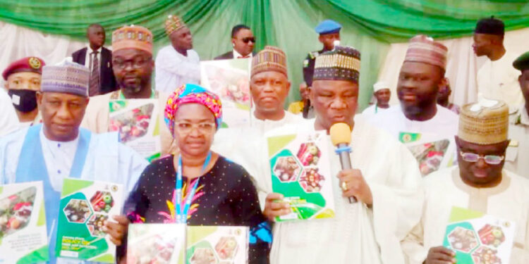 Gombe State deputy governor, Manassah Daniel Jatau ( 2nd right) leading other officials to launch the Gombe State 5- year multi sectoral action on nutrition
