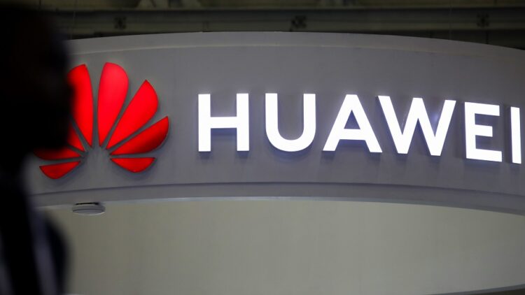 An illuminated logo above the Huawei Technologies Co. stand at the Enlit energy conference in Cape Town, South Africa, on Tuesday, May 16, 2023. Africas most industrialized economy has been dogged by rotating blackouts since 2008. Photographer: Dwayne Senior/Bloomberg