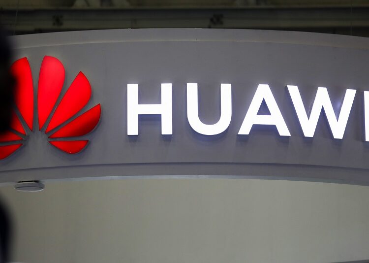 An illuminated logo above the Huawei Technologies Co. stand at the Enlit energy conference in Cape Town, South Africa, on Tuesday, May 16, 2023. Africas most industrialized economy has been dogged by rotating blackouts since 2008. Photographer: Dwayne Senior/Bloomberg