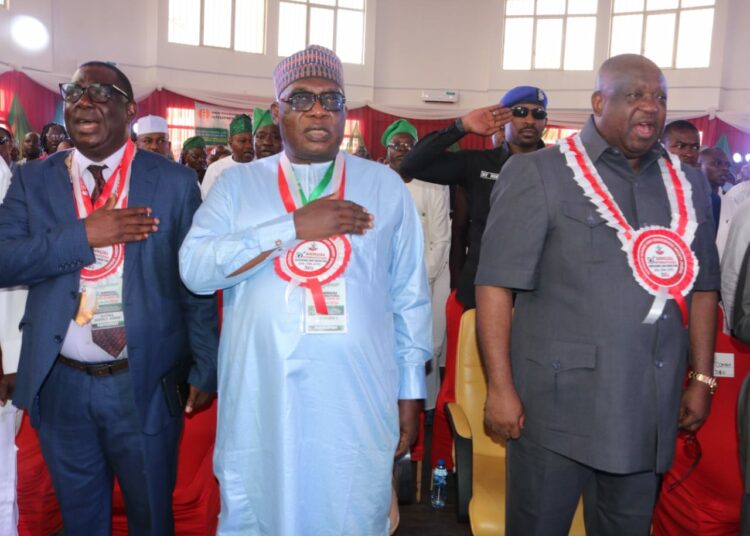 Plateau State governor, Caleb Mutfwang (right); representative of the Minister of Solid Minerals Development and DG, Mining Cadastral Office, Engr. Obadiah Simon Nkom (centre), and NMGS President, Prof. Olatunji, at the opening ceremony of the Nigerian Mining and Geosciences Society Annual International Conference & Exhibition held at Anguldi Zawan, Jos, Plateau State, on Tuesday.