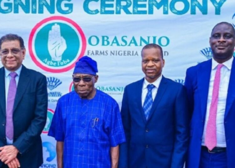 From Left to Right: Global Chief Operations Officer Danone; Mr. Vikram Agarwal, Former President  and Chairman of Obasanjo Farms Limited, Chief Olusegun Obasanjo, Managing Director of Fan Milk PLC, Mr. Kayode Adebiyi, and Director, Legal and Public Affairs, and General Secretary Fan Milk PLC, Olakunle Olusanya, at the signing ceremony between Fan Milk- Danone and Obasanjo Farms.