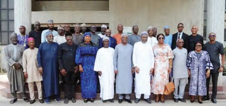 The executive secretary TETFund, Arc. Sonny Echono (6th right) with the chairmen and members of the newly inaugurated Ad-Hoc Committees at the Fund's Headquarter in Abuja, recently.