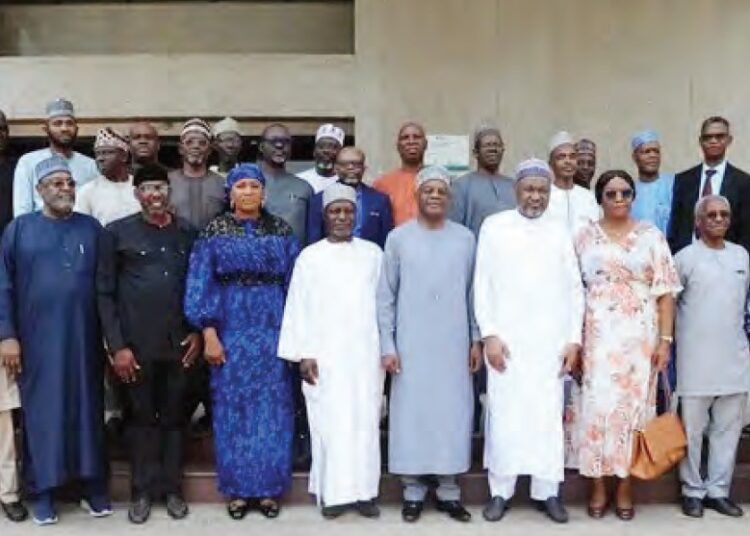 The executive secretary TETFund, Arc. Sonny Echono (6th right) with the chairmen and members of the newly inaugurated Ad-Hoc Committees at the Fund's Headquarter in Abuja, recently.