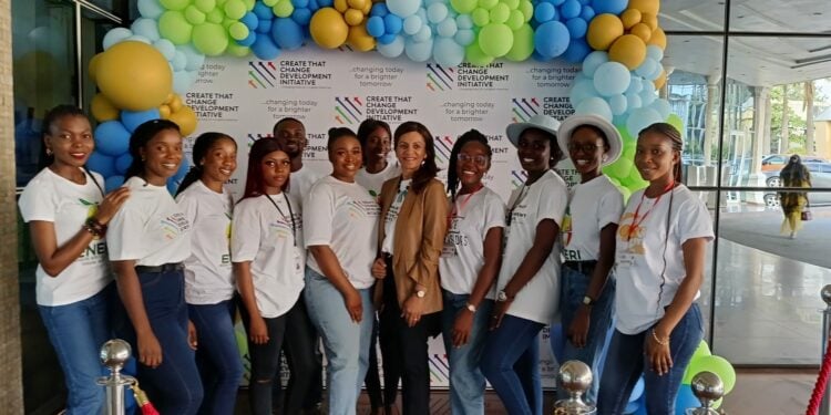 Founder, CCDI, Mrs Sharon Ayeni, with workers and volunteers.
