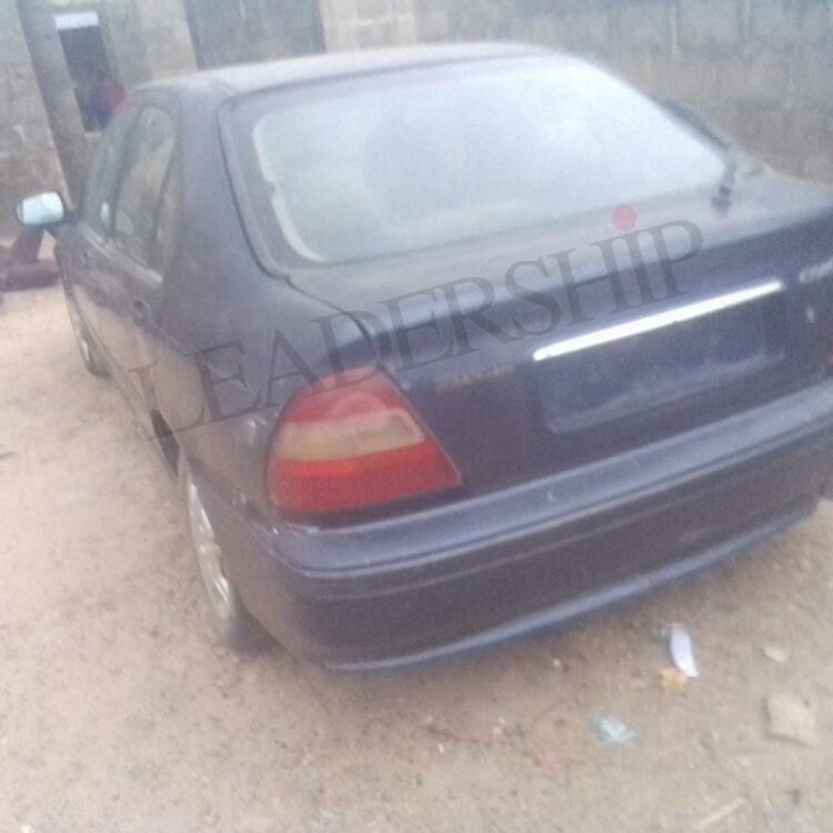 The unused car in which the bodies of the five children were found in Minna, Niger State, on Sunday evening.