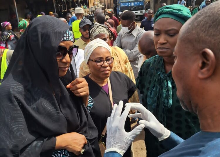 The Kwara State government officials who  confiscated beef of the suspected poisoned cows at the Mandate Market, Adewole, Ilorin, on Sunday. Photo by Abdullahi Olesin, Ilorin.