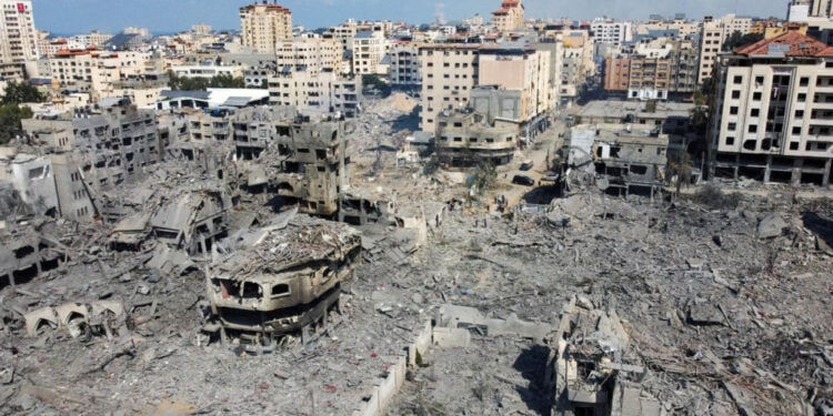A view shows houses and buildings destroyed by Israeli strikes in Gaza City, October 10, 2023. REUTERS/Mohammed Salem     TPX IMAGES OF THE DAY