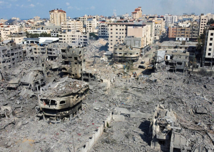 A view shows houses and buildings destroyed by Israeli strikes in Gaza City, October 10, 2023. REUTERS/Mohammed Salem     TPX IMAGES OF THE DAY