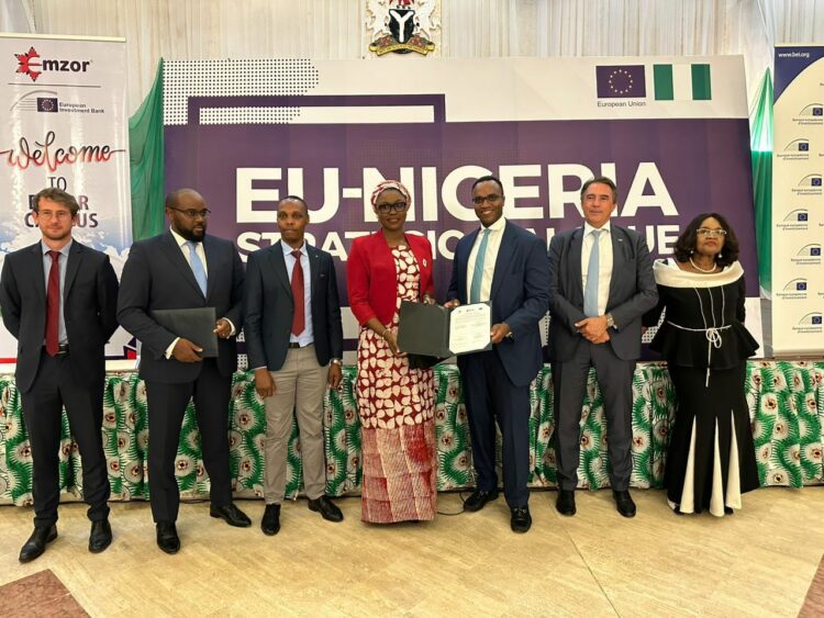 L-R: Arthur Delor, Investment Officer Project Finance Division, EIB; Moussa Nakoulima, Loan Officer, Public Service, EIB; MR Frankline Keter, CEO, APIFA; DR Jamila Bio Ibrahim, Honorable Minister of Youth; MR Emeka Okoli, Chairman of Emzor Pharmaceuticals; MR Diederick Zambon, Director for International Partners, EIB Global and Dr Stella C. Okoli, OON, Group Managing Director, Emzor Pharmaceutical Industries Ltd, at the official signing of a financing agreement for the Active Pharmaceutical Ingredient Plant, between Emzor and EIB,  which held at the Presidential Villa