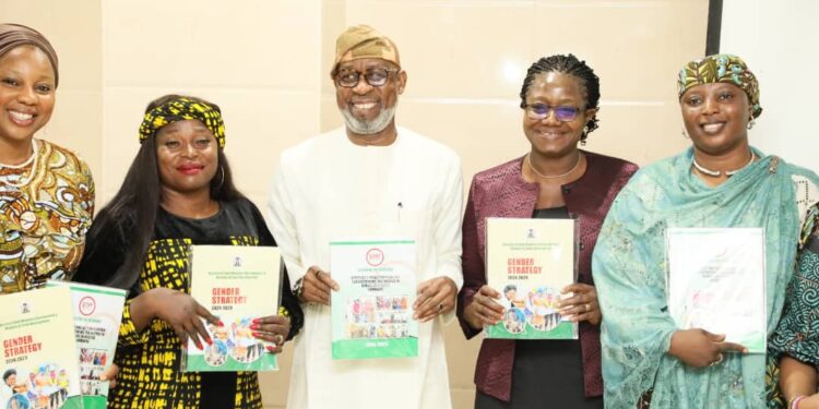 L-R: Representative of the National President of Women In Mining In Nigeria WIMIN, Mrs Emily Ofodile( Social Secretary); N&G Consultant; Hon Minister for Solid Minerals Development Dr Dele Alake; Permanent Secretary, Dr Mary Ogbe & WIMIN Executive; during the Unveiling of the Gender Strategy by the Hon. Minister