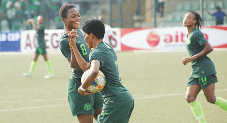 Lawal right celebrating with teammate Ogbuchi