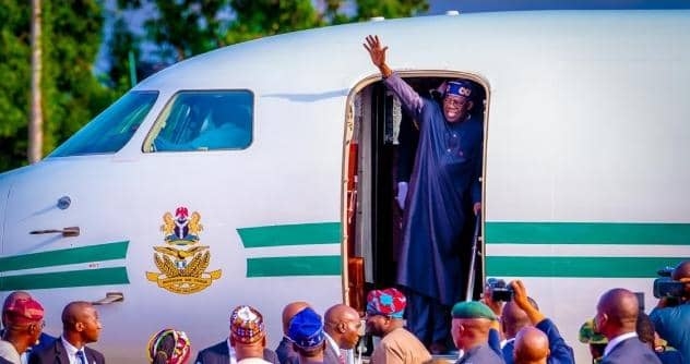 Tinubu on airplane