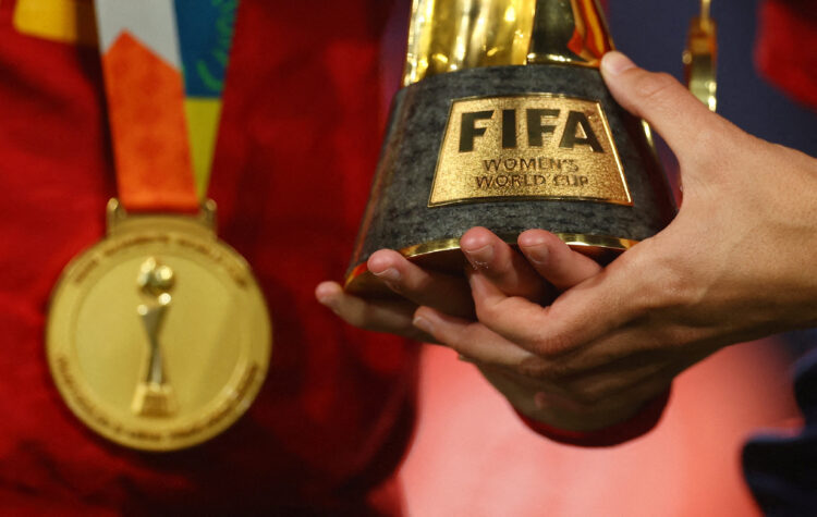 FILE PHOTO: Soccer Football - FIFA Women's World Cup Australia and New Zealand 2023 - Final - Spain v England - Stadium Australia, Sydney, Australia - August 20, 2023 General view of a Spain player holding the World Cup trophy after the match REUTERS/Carl Recine/File Photo