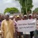 Pandemonium As Thugs Attack Anti-Ganduje Protesters At APC Headquarters 5 Pandemonium As Thugs Attack Anti-Ganduje Protesters At APC Headquarters