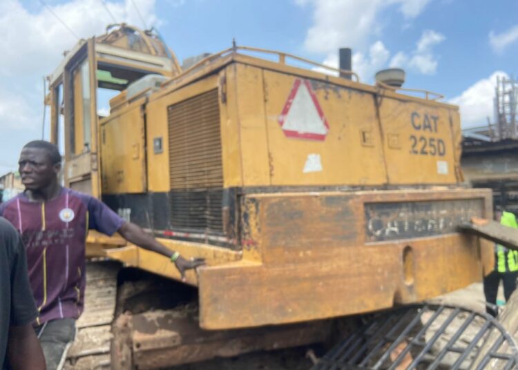 The excavator which ran into the mosque building.