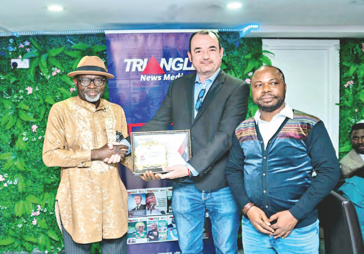 Chief press secretary to Bayelsa State governor, Daniel Alabrah (left) receiving the Triangle Magazine Governor of the Year award on behalf of Governor Duoye Diri from the UK Mobility Security, Compliance Vice President of EMEA, Nicanor Chavez, while the publisher, Triangle Magazine, Otunba Femi Salako, looks on during the Triangle Face Of Africa Awards in London, United Kingdom, at the weekend.