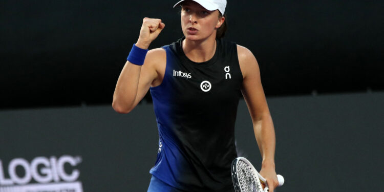 Tennis - WTA Finals - Cancun, Mexico - November 6, 2023 Poland's Iga Swiatek reacts during her final match against Jessica Pegula of the U.S. REUTERS/Henry Romero