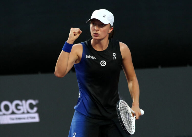 Tennis - WTA Finals - Cancun, Mexico - November 6, 2023 Poland's Iga Swiatek reacts during her final match against Jessica Pegula of the U.S. REUTERS/Henry Romero