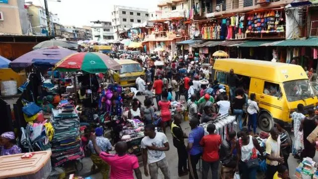 A Year After, Nigerians Still Lament Hardship 1 Nigerians