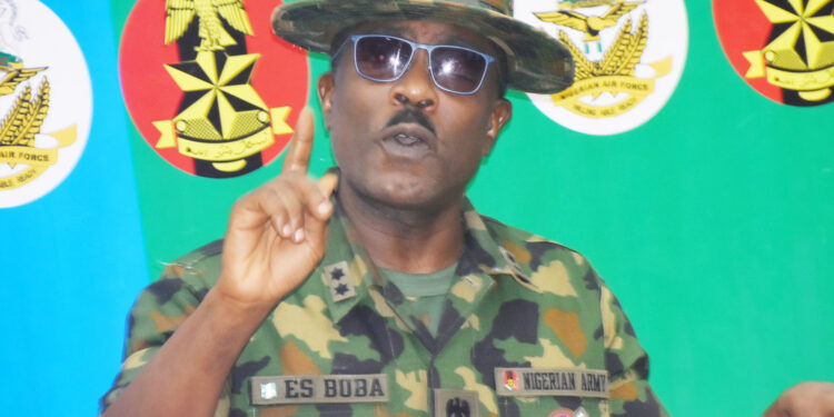 Pic.6. Director of  Defence Media Operation, Maj.-Gen Edward Buha, addressing newsmen, during the End of Year Biweekly press briefing in Abuja on Friday (29/12/23).
04962/29/12/2023/Johnson Udeani/NAN
