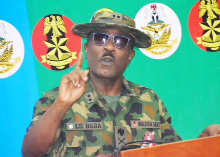 Pic.6. Director of  Defence Media Operation, Maj.-Gen Edward Buha, addressing newsmen, during the End of Year Biweekly press briefing in Abuja on Friday (29/12/23).
04962/29/12/2023/Johnson Udeani/NAN