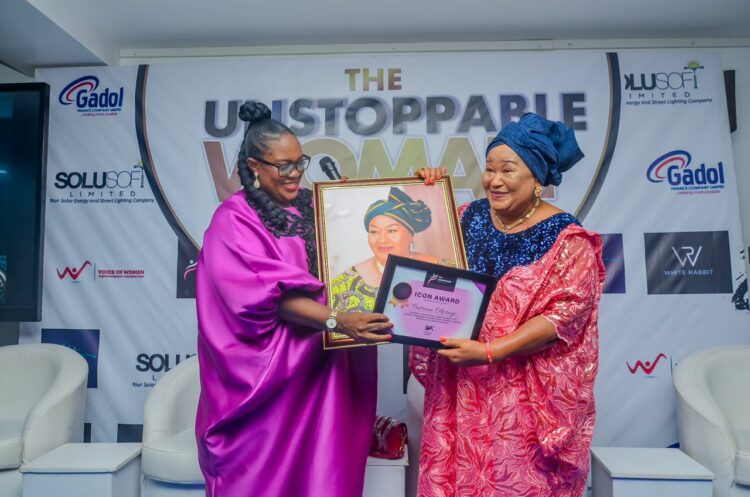 Founder of Unstoppable Women Network, Mrs Ijeoma Igbaji delivering 
Icon Award to Mrs Patricia Okerayi during the event.