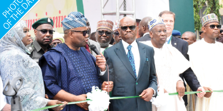 L-R: Minister of state for FCT, Dr Mariya Mohmoud; representative of the president, Senator Godswill Akpabio; minister of FCT, Nyesom Wike and the national chairman of All Progressives Congress (APC), Abdullahi Ganduje, during the presidential commissioning Roads B6, B12, and circle road, Central Area in Abuja, yesterday.