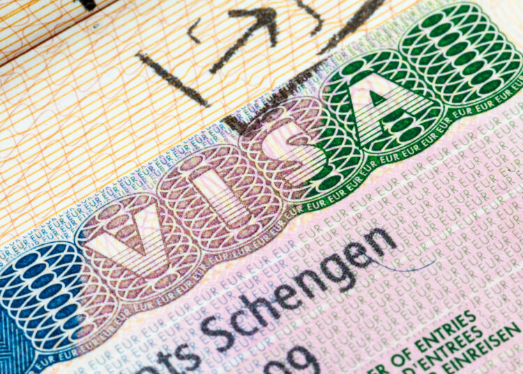 European Schengen visa stamp in the passport