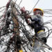 ELECTRICITY DISCONNECTION…Ministers, Top Officials Abandon Offices, Work From Home 5 Abuja Electricity Distribution Company staff disconnecting a termina