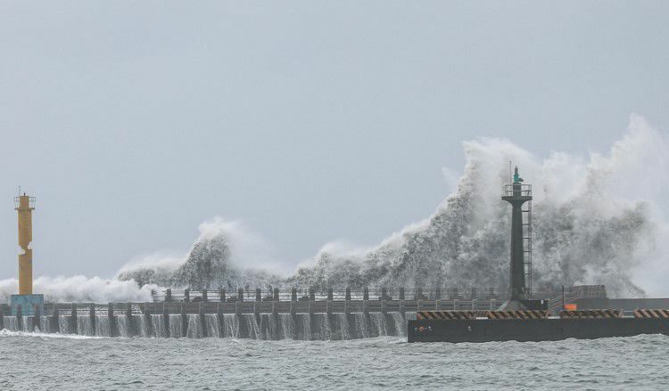 Waves break on the coastline in Yilan on July 24, 2024 as Typhoon Gaemi approaches Taiwan. (Photo by I-Hwa CHENG / AFP)