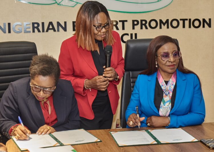 ED/CEO, National Export Promotion Council (NEPC), Mrs. Nonye Ayeni (right), during the official signing of MoU with the Founder, Lelook Bags Academy, Mrs. Chinwe Ezenwa (left), at the NEPC headquarters in Abuja, on Thursday.