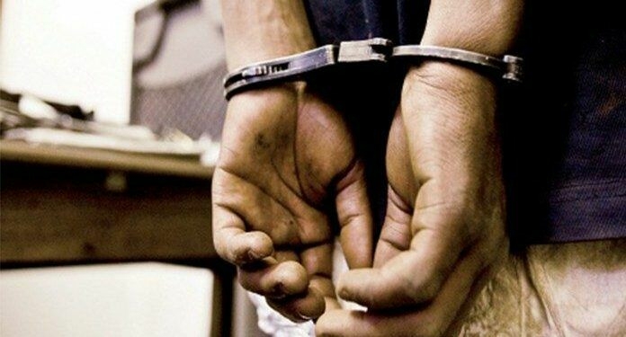 Police Arrest 186 Suspected Kidnappers In October 1 Police handcuffs