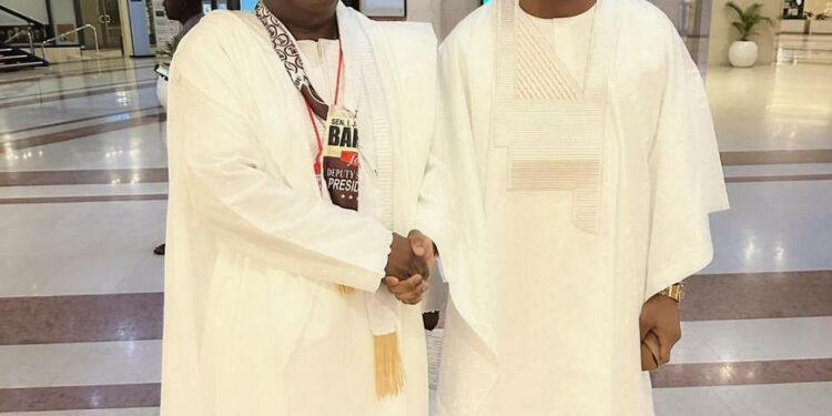 L-R: Minister of Works, Engr. David Umahi and son, Osborn Umahi.