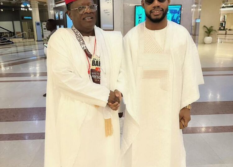 L-R: Minister of Works, Engr. David Umahi and son, Osborn Umahi.